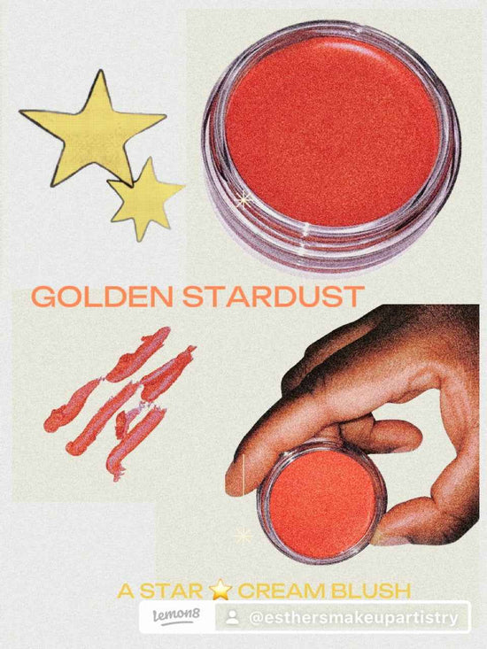 A red pink cream blush in a jar and held by a black woman on a beige cream background with texture marks and stars in the background and this is labelled "Golden stardust"