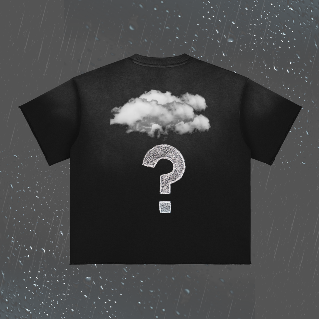 A black short-sleeve T-shirt shown from the back, featuring a white cloud graphic above a large white question mark. The shirt is centered on a dark gray background with raindrop and rain streak effects.
