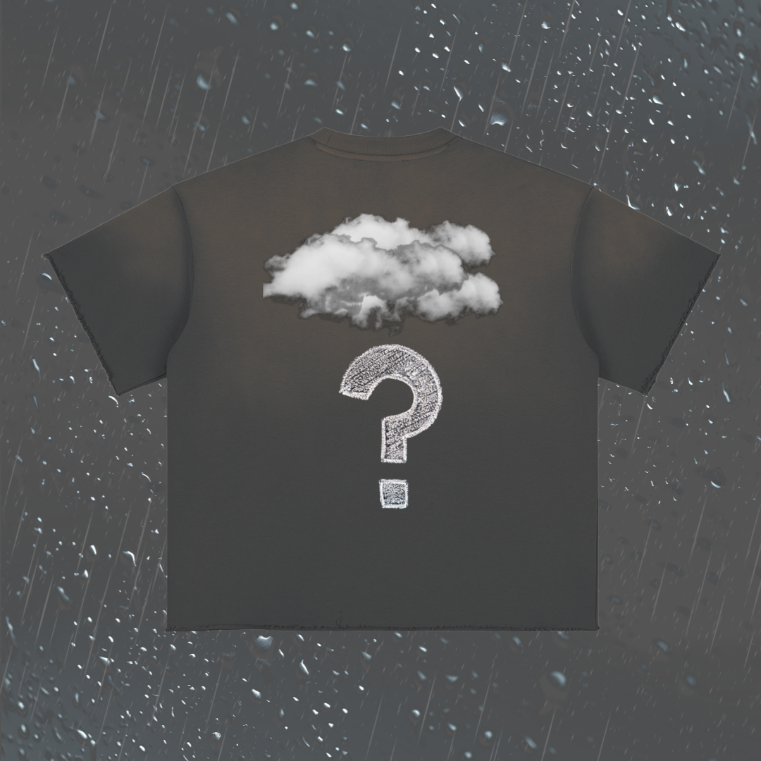 A dark charcoal gray t-shirt with a graphic of a white cloud and a white question mark on the back, set against a dark gray background with raindrops.