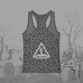 A gray racerback tank top with a dark gray leopard print pattern and a white warning sign graphic on the front, displayed against a spooky graveyard background with a zombie hand illustration.