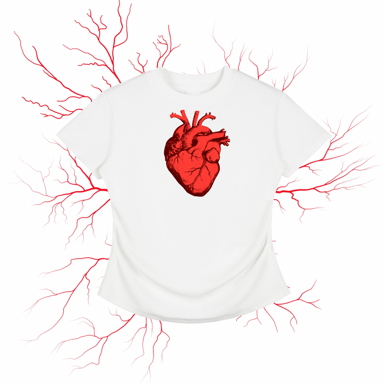 A white short-sleeve crewneck t-shirt featuring a detailed red anatomical heart graphic on the chest, presented against a white background with decorative red branching lines extending outward.