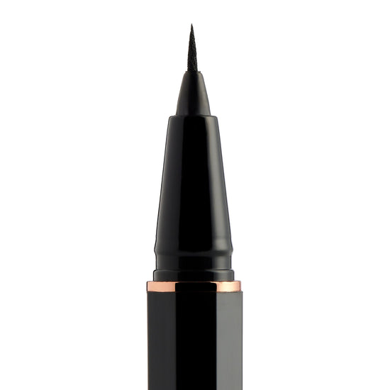Black eyeliner pen with rose gold accents on a white background