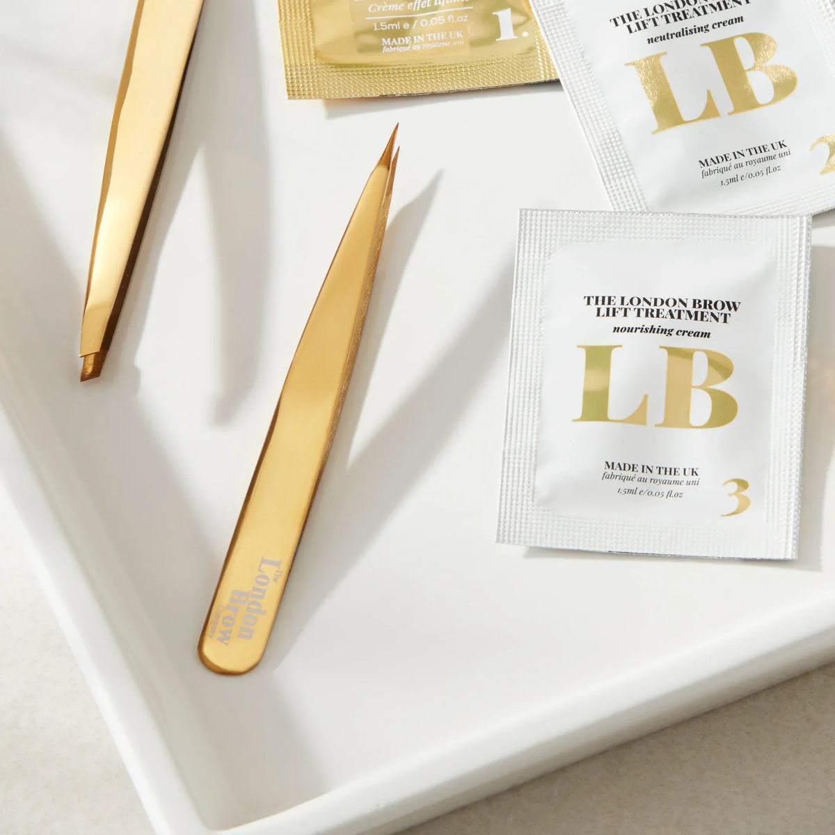 Gold tweezers and &