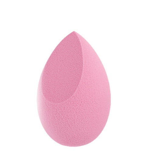 Pink makeup sponge on a white background