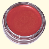Red cosmetic cream blush in a clear container on a light yellow background