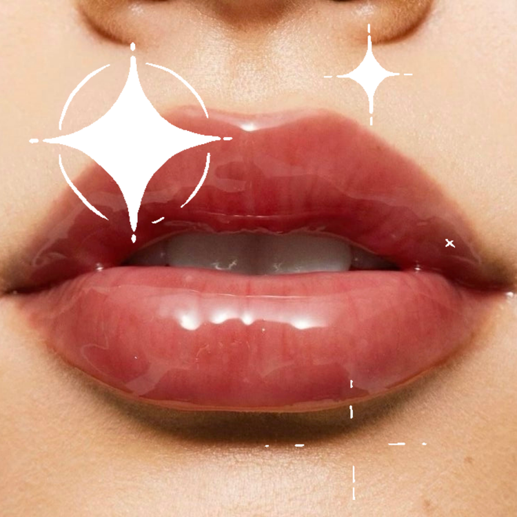Close-up of glossy lips with decorative elements. Brown-reddish lip balm on Asian/Caucasian person.